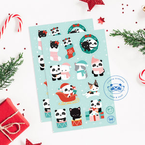 Two christmas themed vinyl sticker sheets talked on top of each other featuring Pandasal the panda and cats. There are christmas themed candy and decorations on the edges of the images.